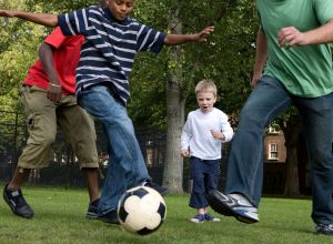 family playing outdoors