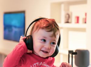 young child with headphones